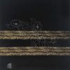 With gold leaf