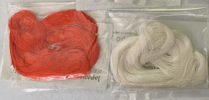 Auction21 -  Couching set: Orange and white couching thread